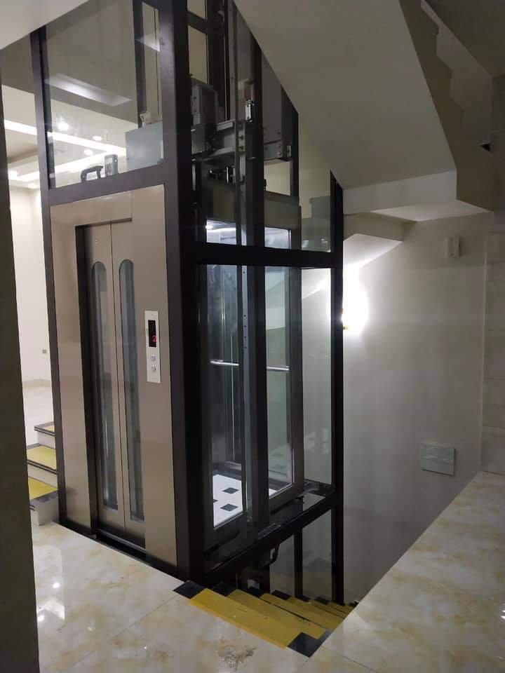Thang Máy Khung Thép Bao Kính Cabin Kính Quan Sát 2026